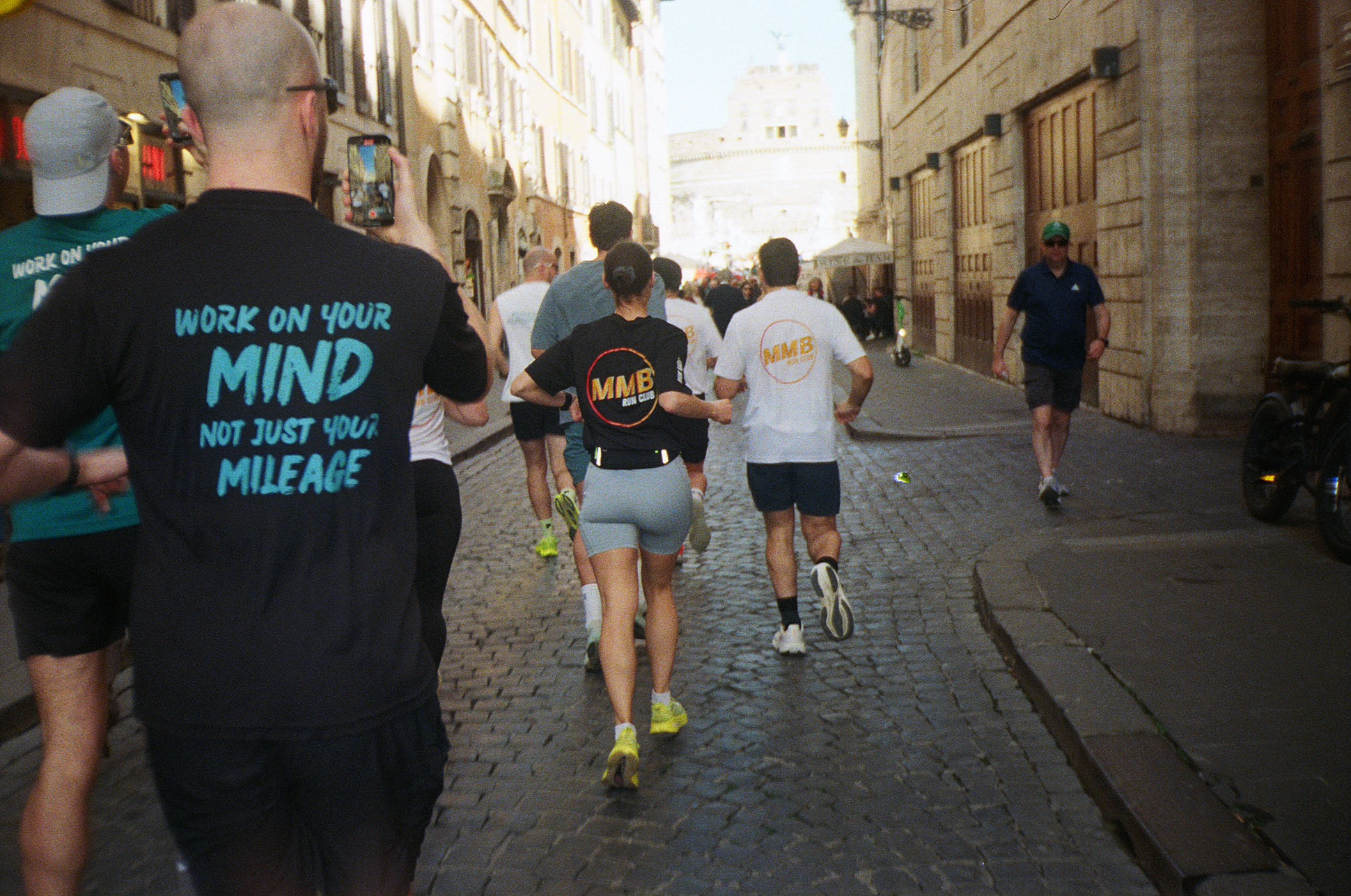 The Mood Booster Run Club running through the streets of Rome