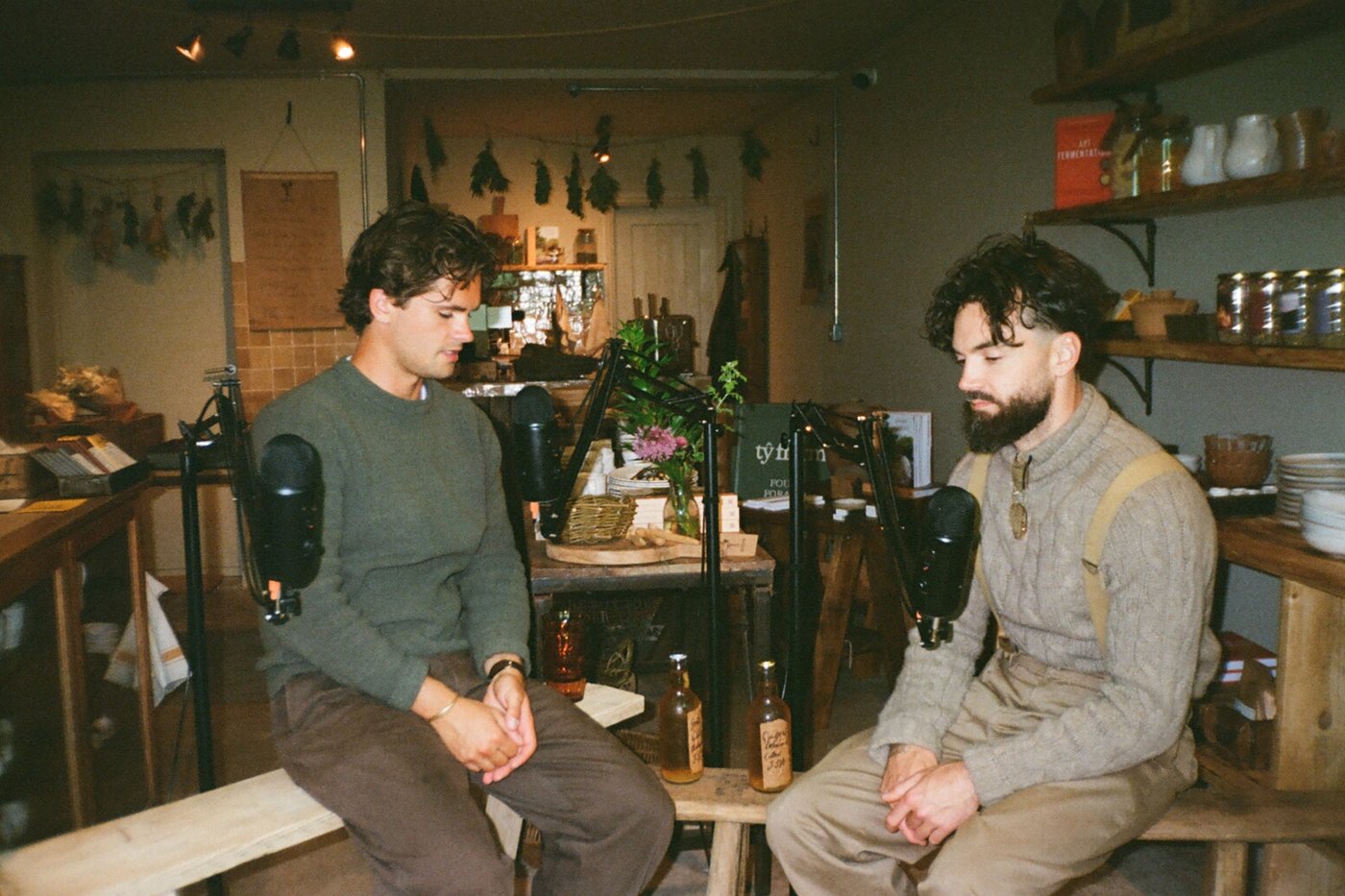 Two people recording a podcast conversation together
